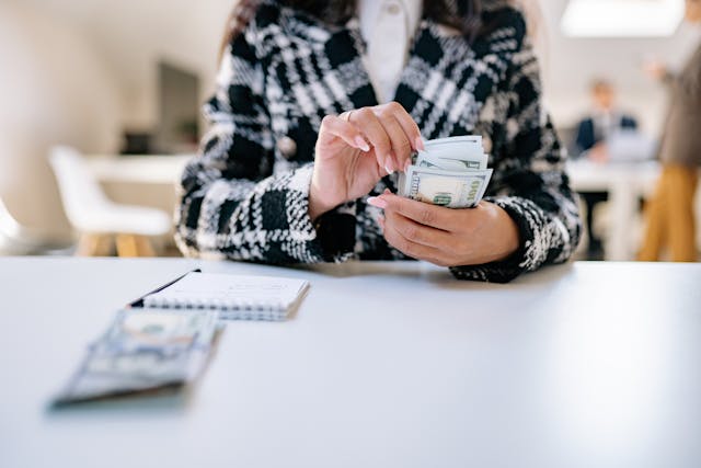 a person counting money